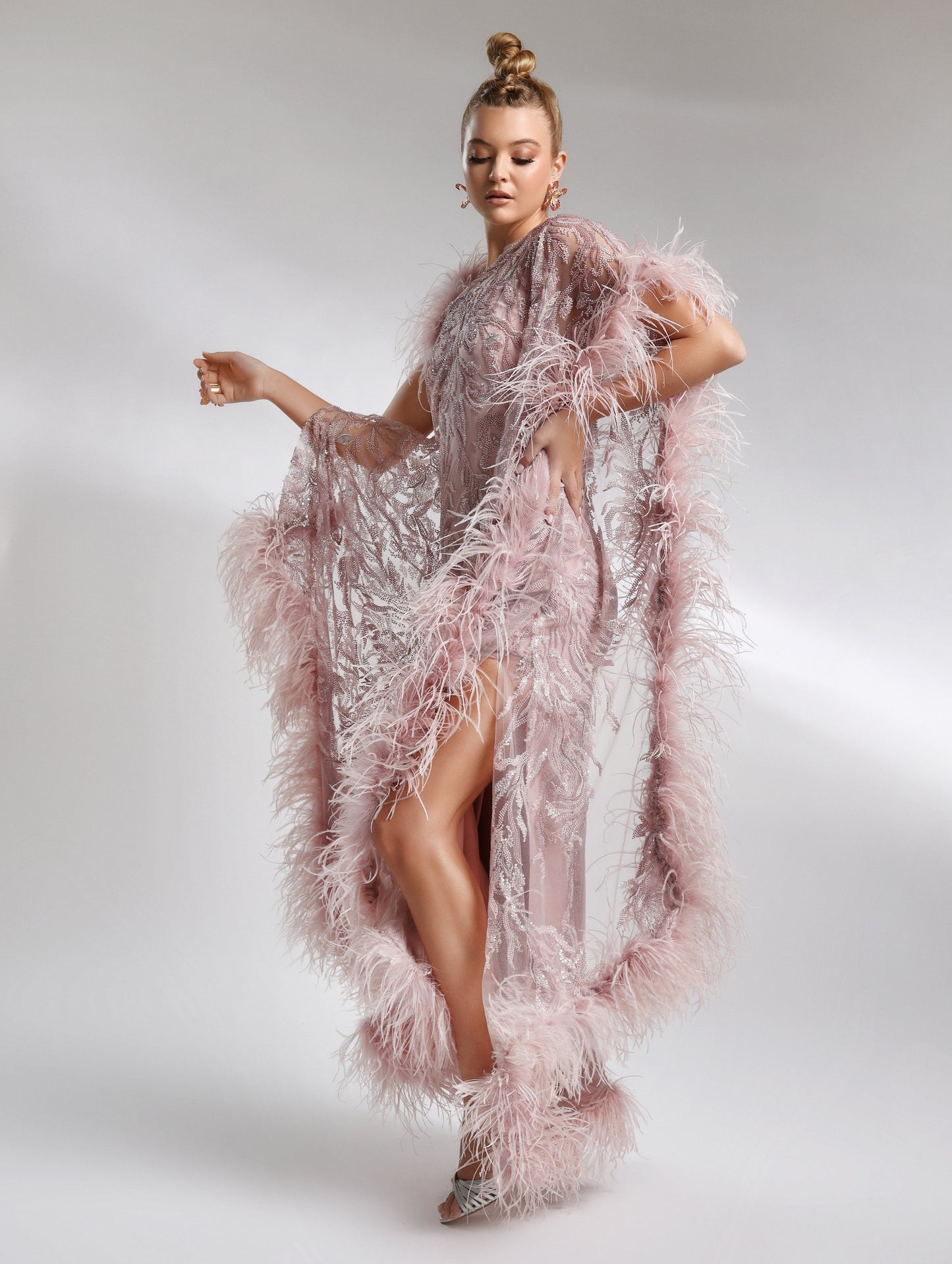 Elegant evening dress with asymmetric embroidery and feather detailing – Biana