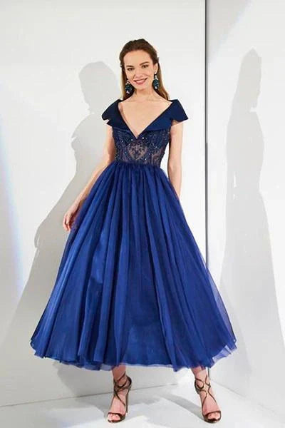 Rochia midi este mereu o alegere de succes