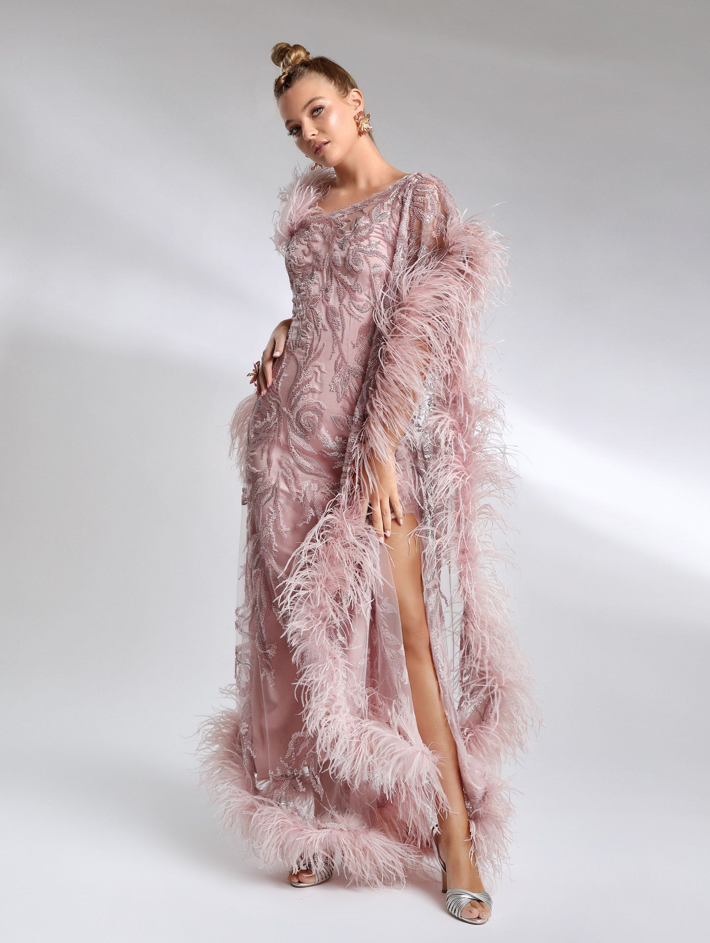 Elegant evening dress with asymmetric embroidery and feather detailing – Biana