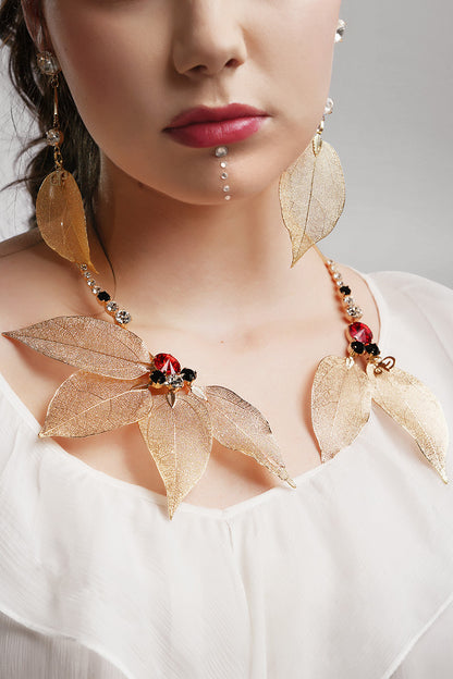 Colier asimetric auriu cu cristale Spring